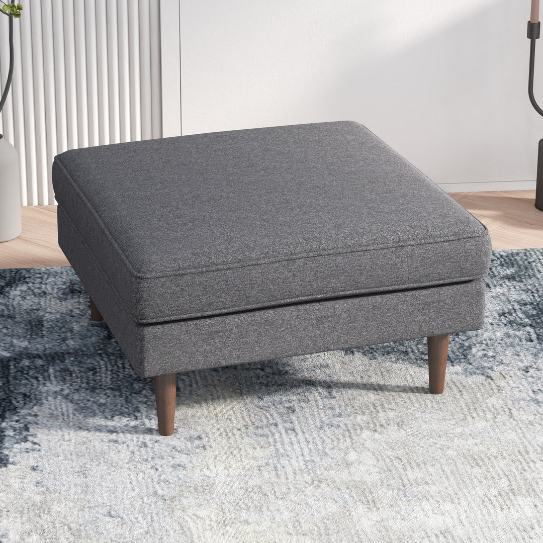 The Amber Square Upholstered Ottoman in Dark Grey